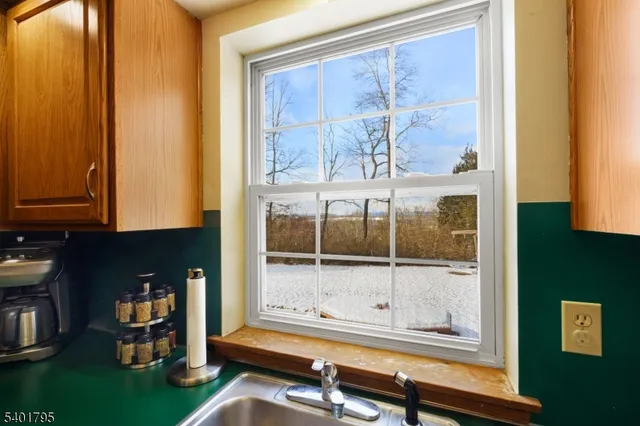 a room with furniture and a window