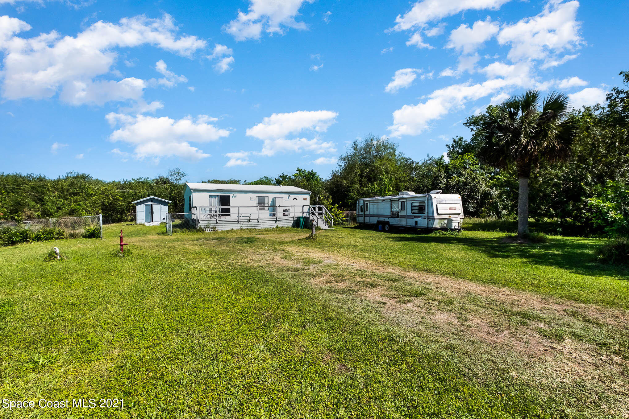 1965 Hammock Road Titusville, FL 32796 - Photo 2 of 17 Front Yard