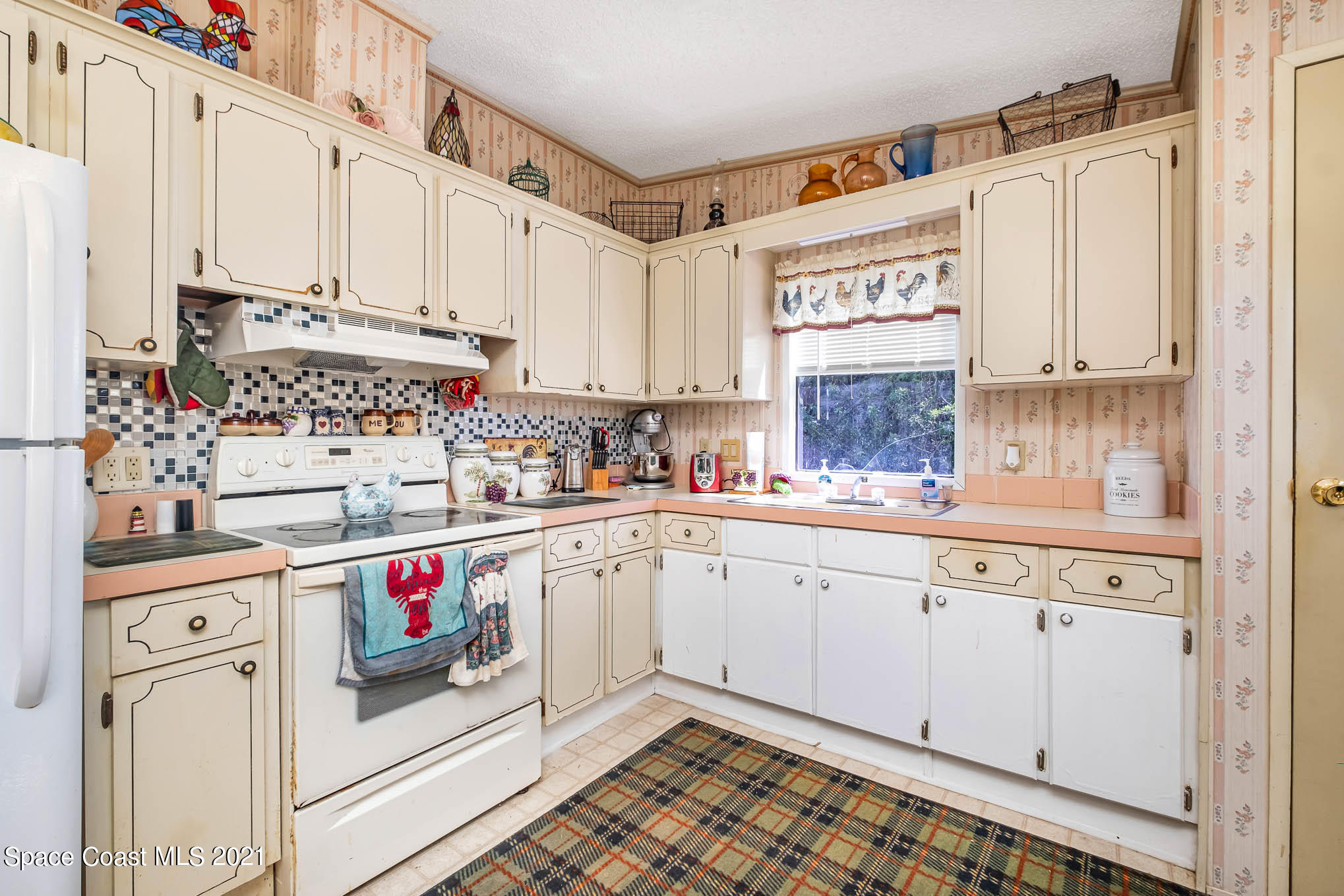 1965 Hammock Road Titusville, FL 32796 - Photo 5 of 17 Kitchen 2