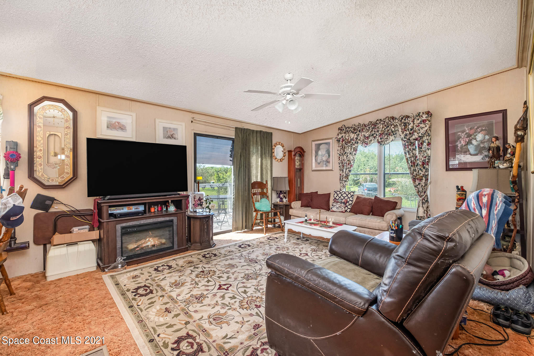1965 Hammock Road Titusville, FL 32796 - Photo 10 of 17 Living Room 2