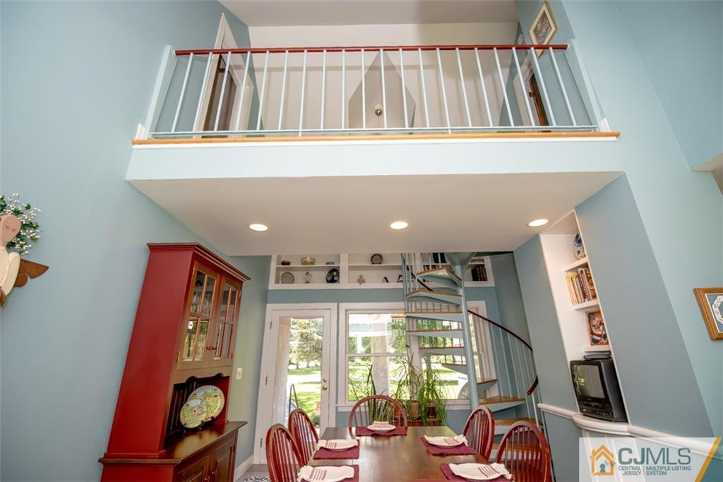91 Conover Road West Windsor, NJ 08550 - Photo 8 of 25 a view of a hallway with furniture and front door