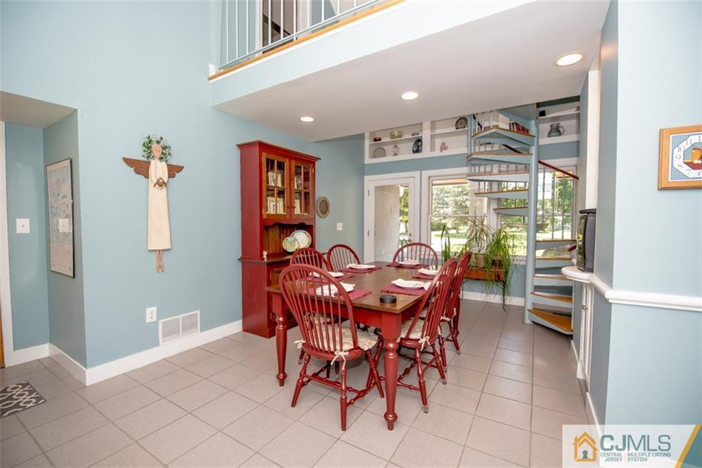 91 Conover Road West Windsor, NJ 08550 - Photo 9 of 25 a view of a dining room with furniture and a window