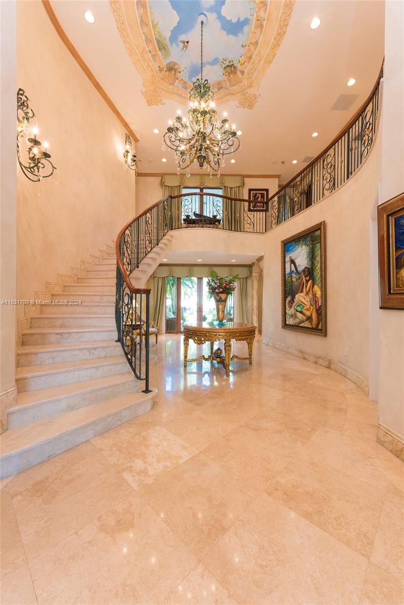 5655 Pine Tree Drive Miami Beach, FL 33140 - Photo 15 of 21 a view of a hall with front door