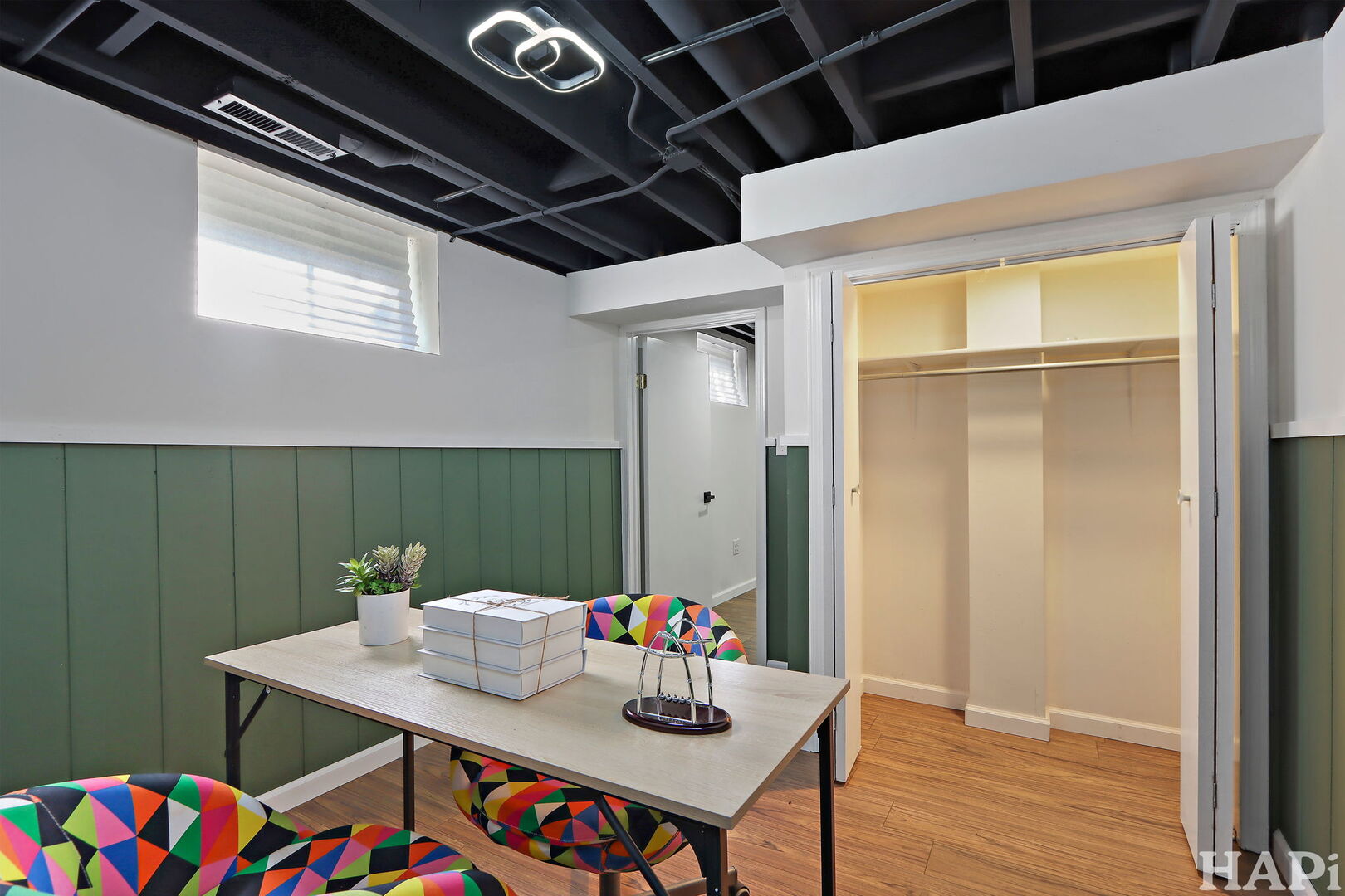 2440 West Cheyenne Road Waukegan, IL 60087 - Photo 16 of 26 a workspace with furniture and wooden floor