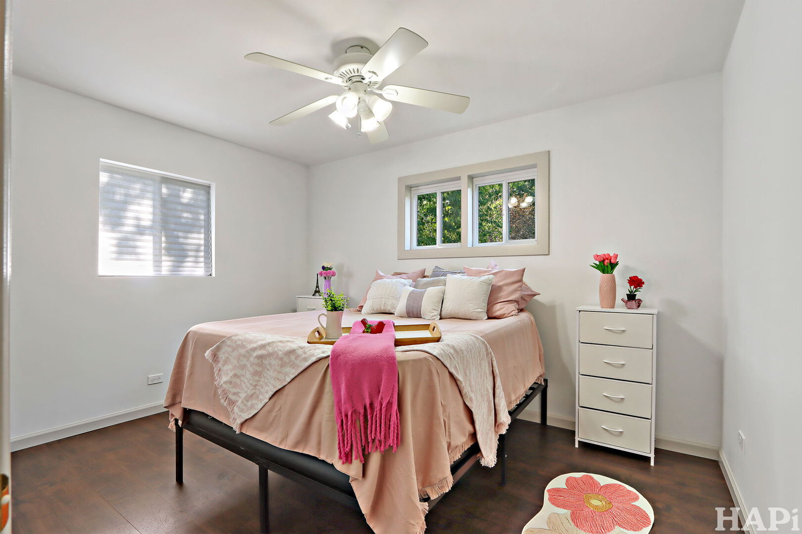 2440 West Cheyenne Road Waukegan, IL 60087 - Photo 7 of 26 a bed room with a bed and a chandelier