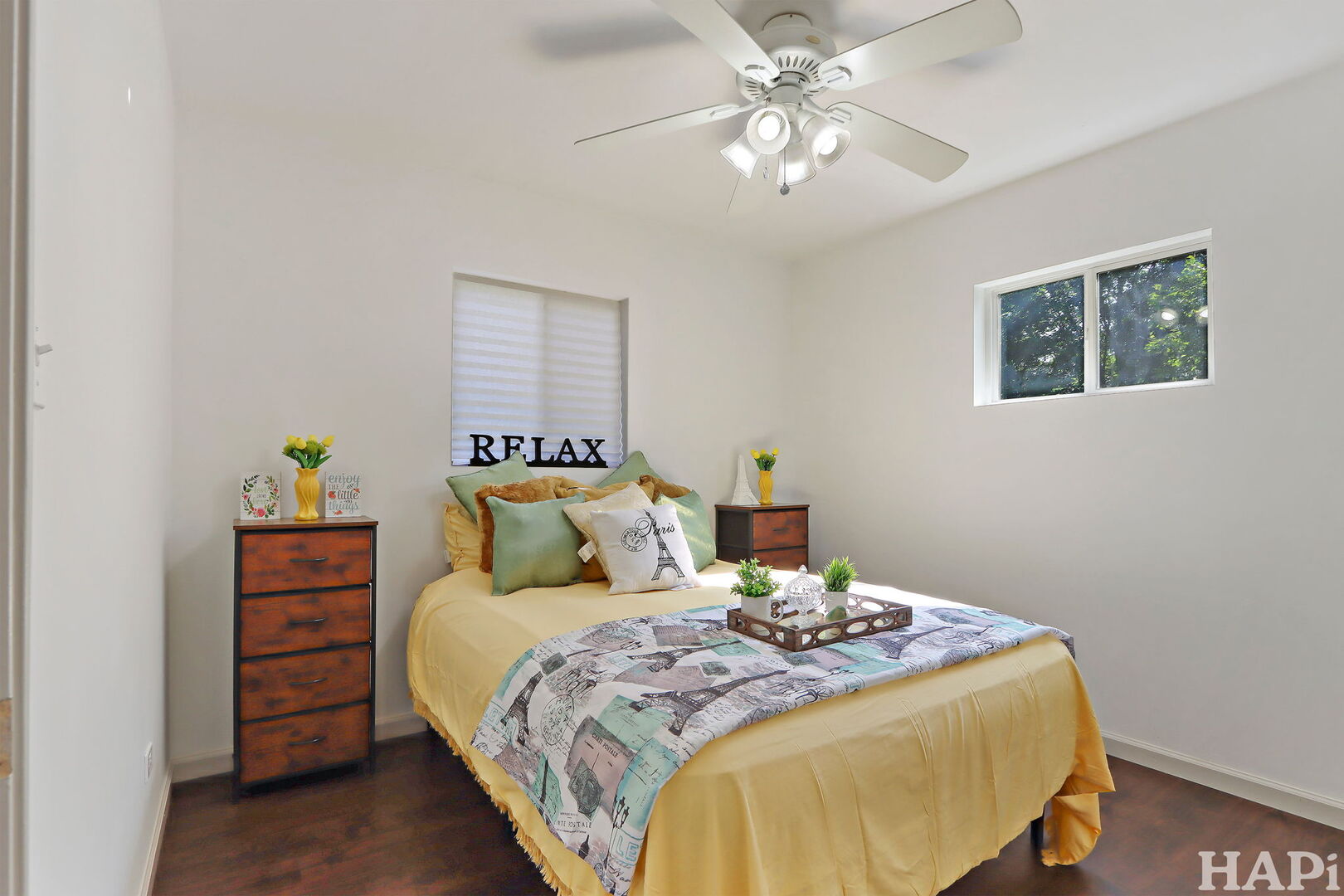 2440 West Cheyenne Road Waukegan, IL 60087 - Photo 10 of 26 a bedroom with a bed and a chandelier