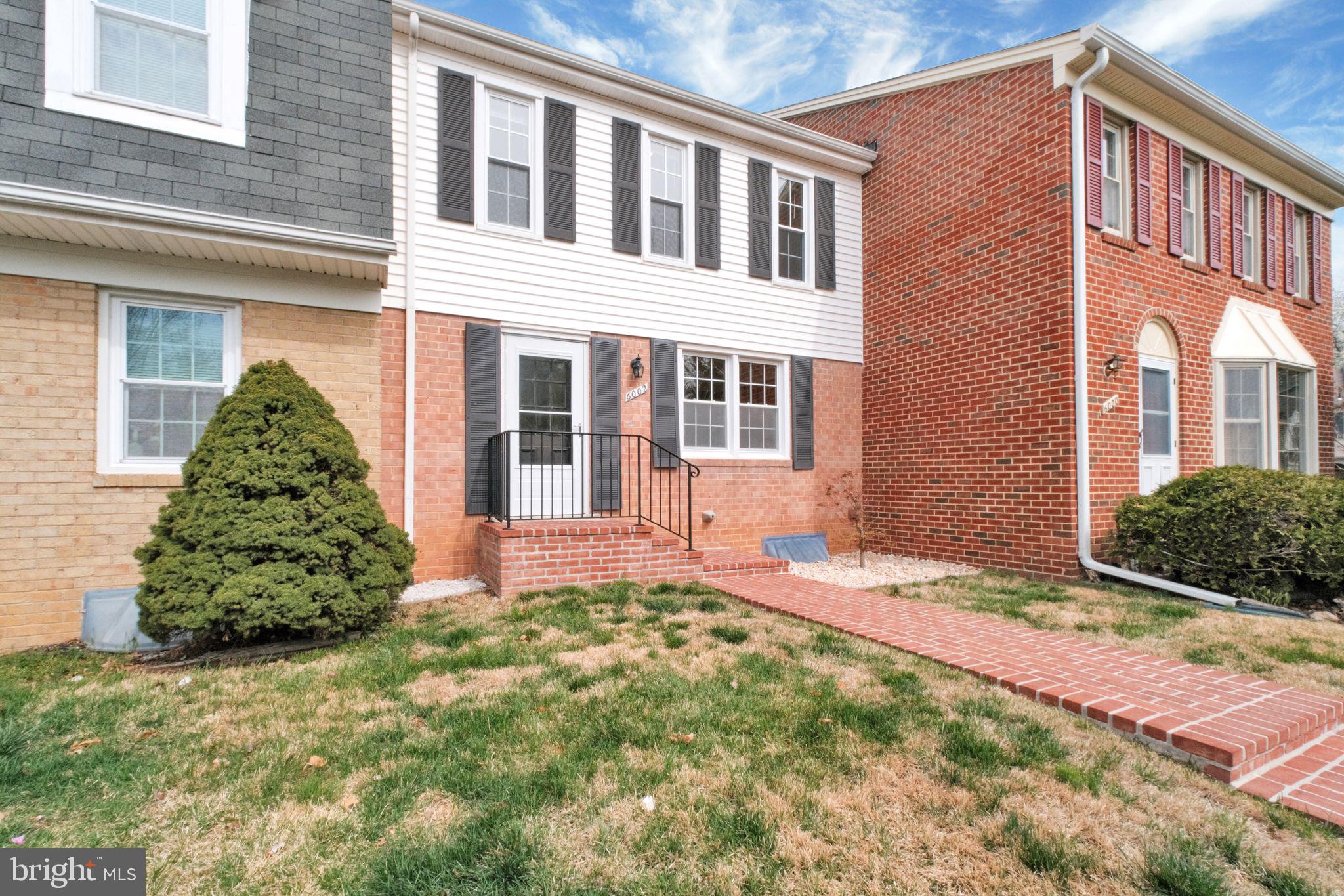 6002 Mardale Lane Burke, VA 22015 - Photo 1 of 28 a house view with a garden space