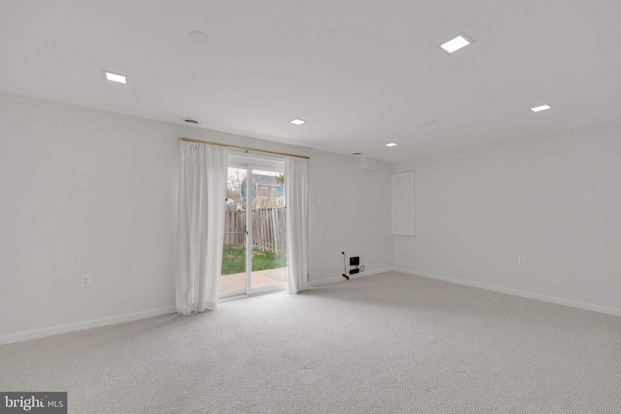 6002 Mardale Lane Burke, VA 22015 - Photo 21 of 28 a view of an empty room with a window