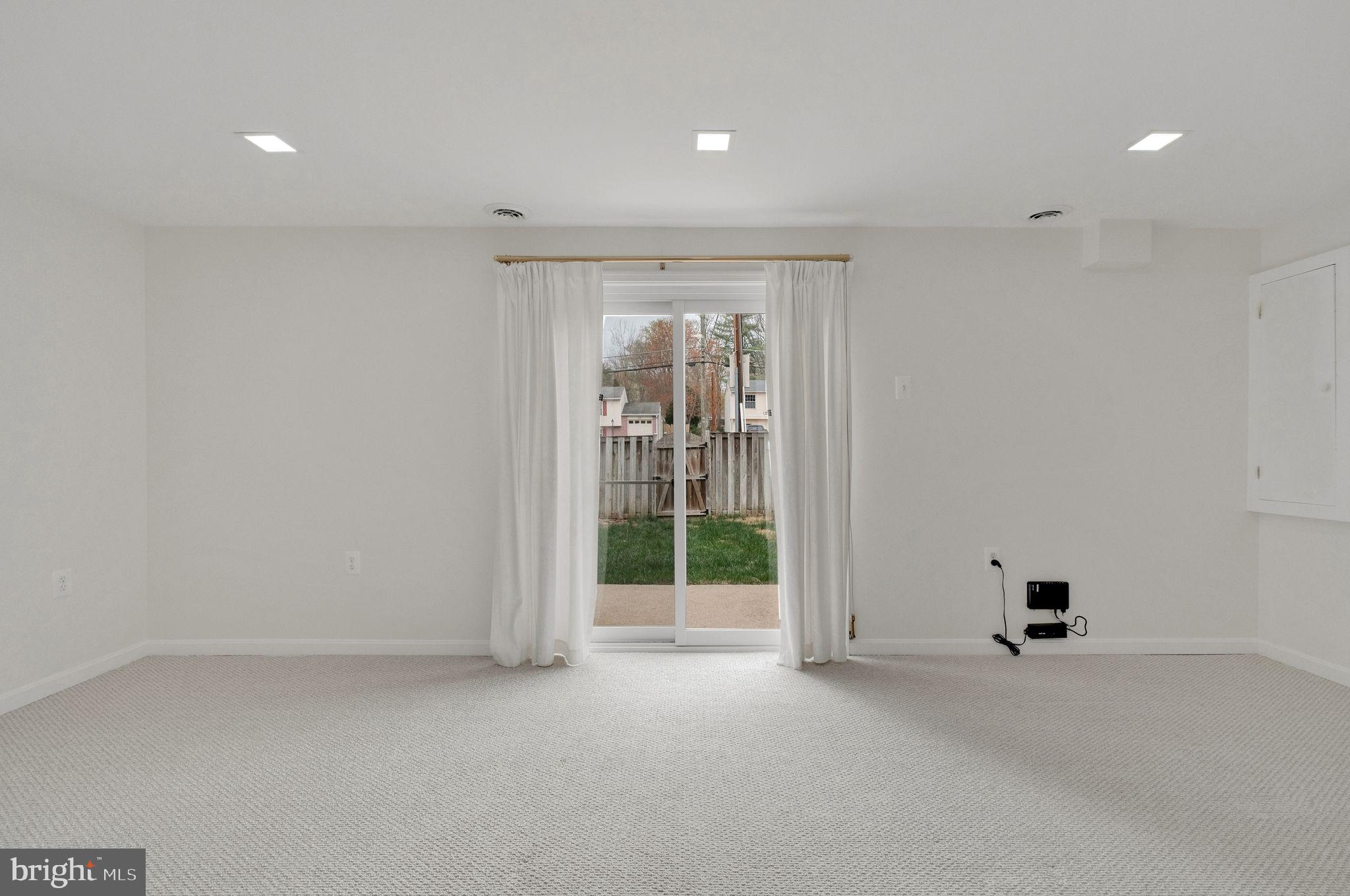6002 Mardale Lane Burke, VA 22015 - Photo 23 of 28 a view of an empty room with a window