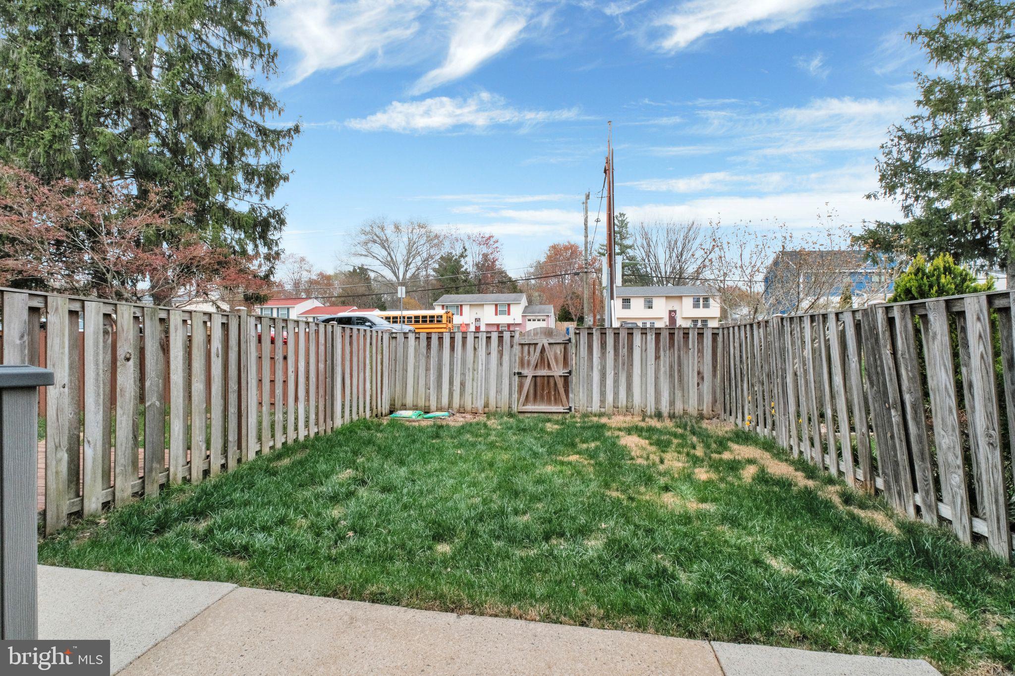 6002 Mardale Lane Burke, VA 22015 - Photo 26 of 28 a view of a garden with wooden fence