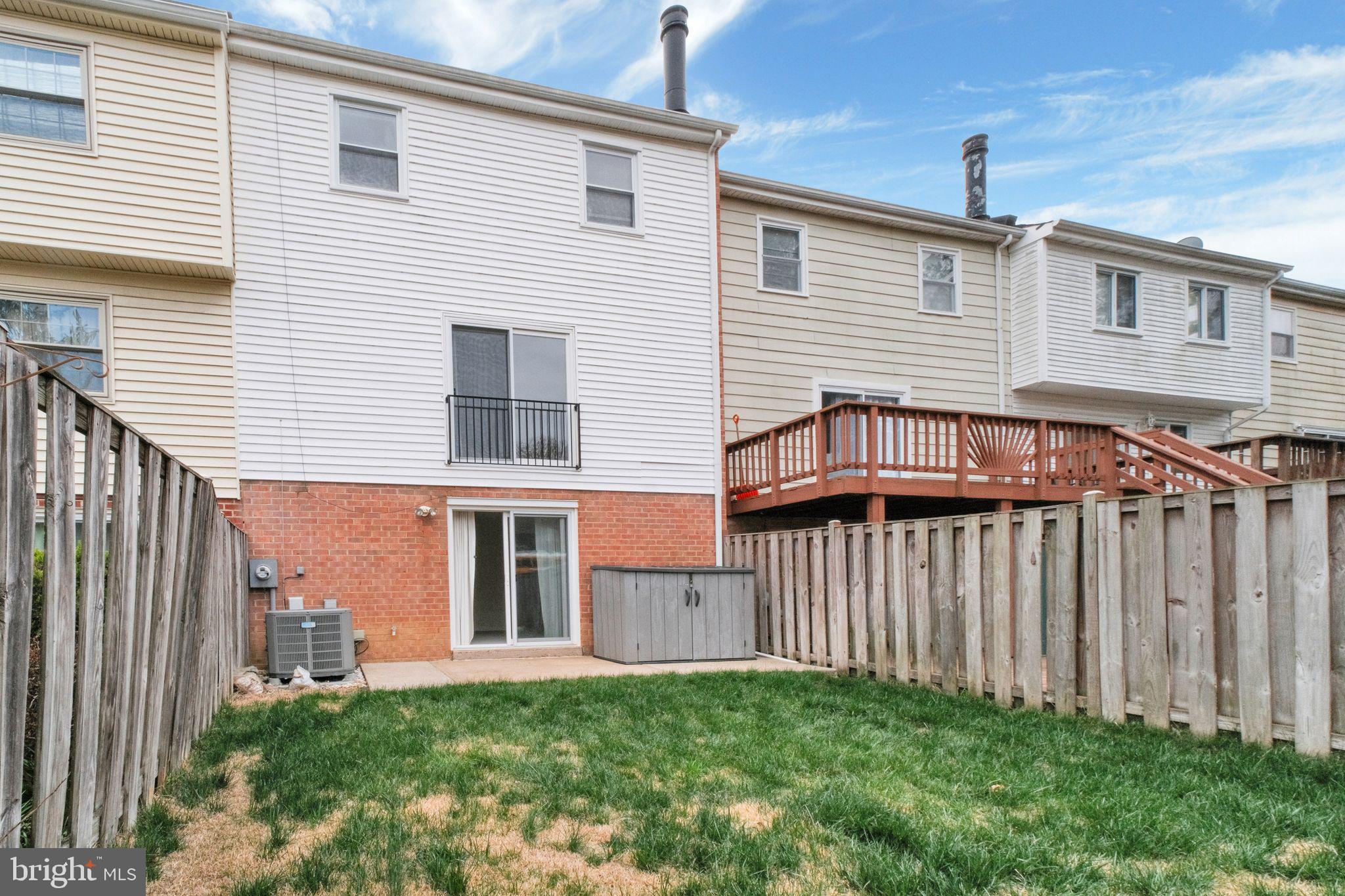 6002 Mardale Lane Burke, VA 22015 - Photo 27 of 28 a front view of a house with a yard