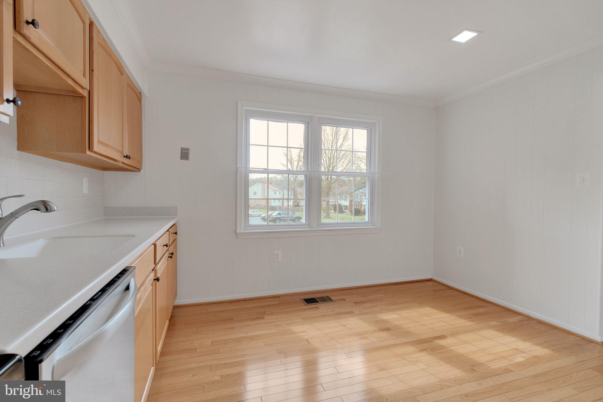 6002 Mardale Lane Burke, VA 22015 - Photo 9 of 28 a view of a kitchen with a sink and dishwasher