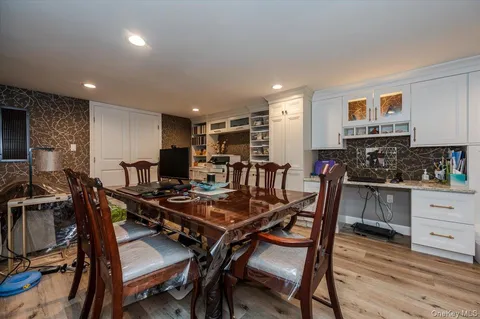 a view of a dining room with furniture