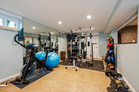 a bed room with a bed and dresser