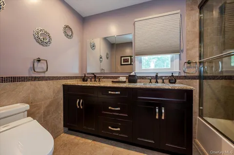 a utility room with window washer and dryer