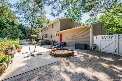 a view of a swimming pool with chairs
