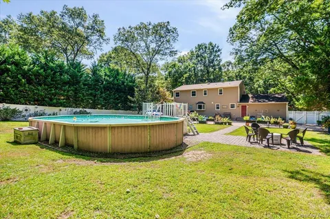 a view of a house with a park