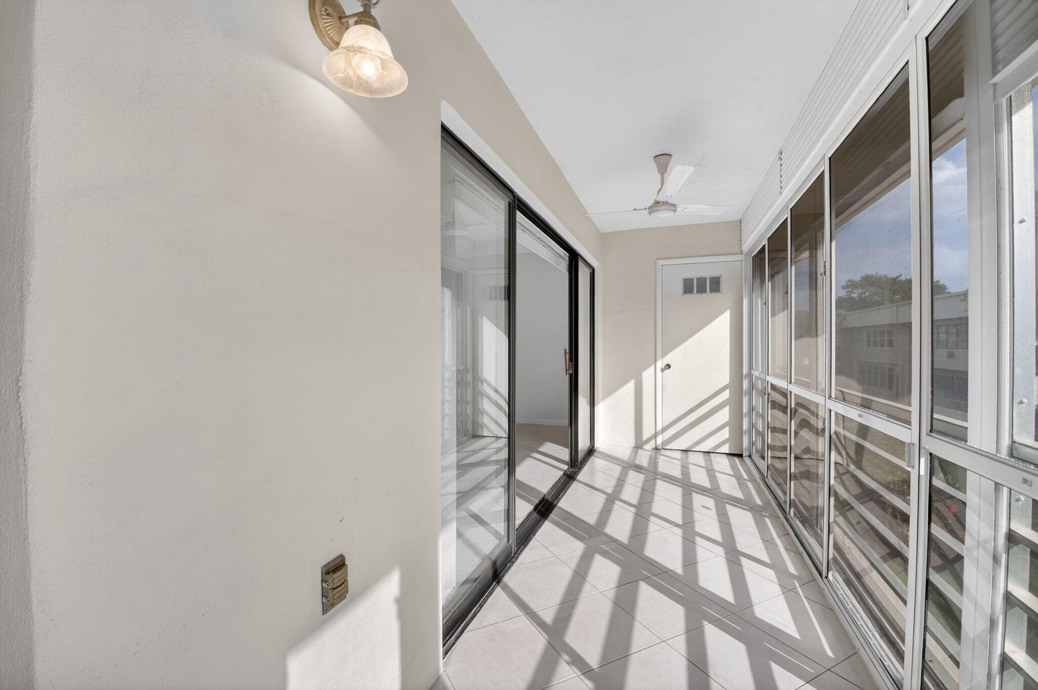 136 Capri B Delray Beach, FL 33484 - Photo 23 of 42 Enclosed Balcony