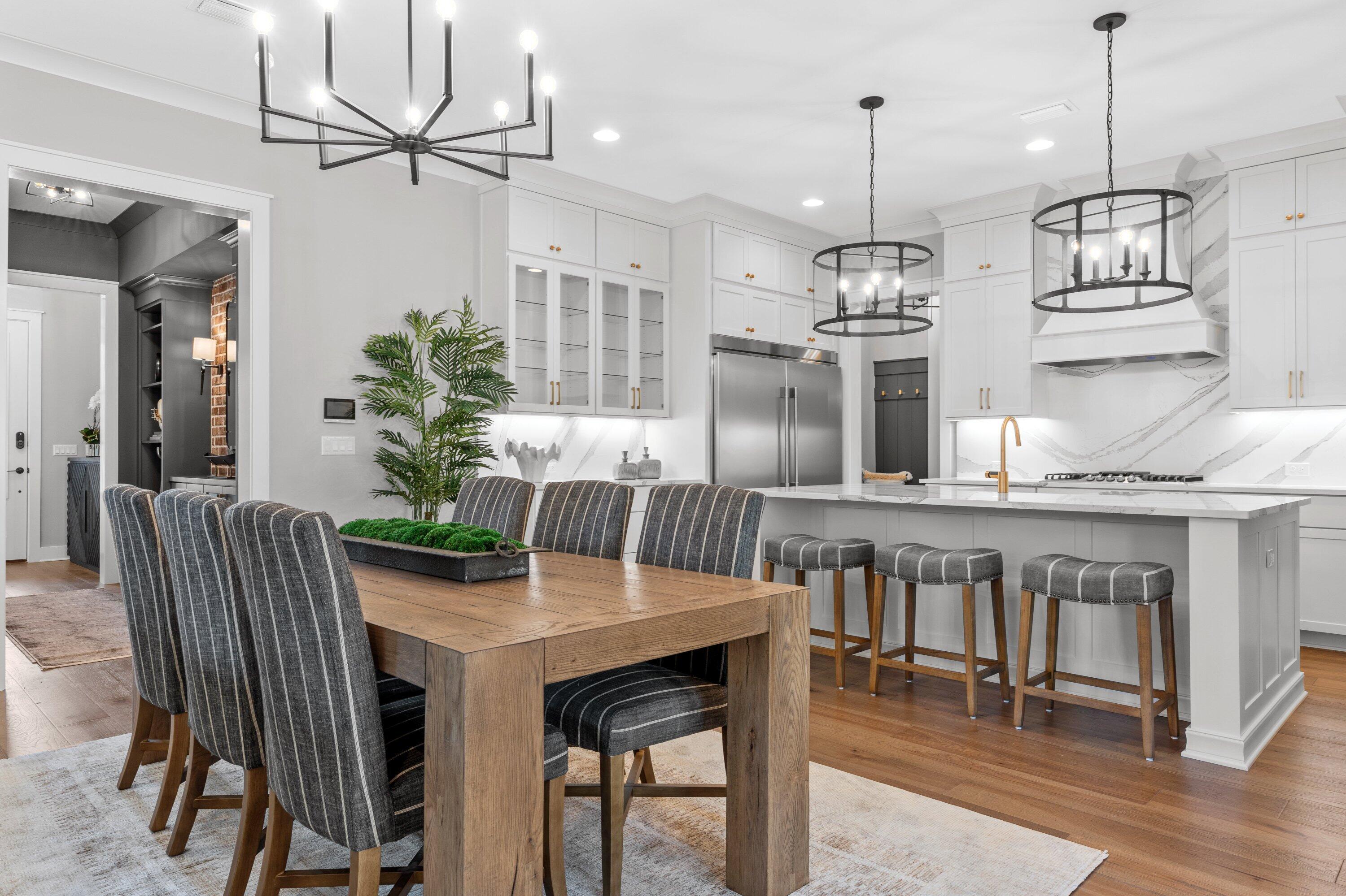 471 Shimmer Circle Freeport, FL 32439 - Photo 17 of 46 a view of a dining room with furniture window and wooden floor