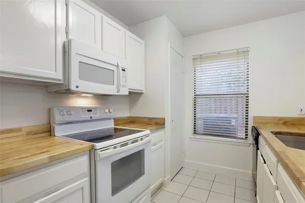 a view of kitchen and sink