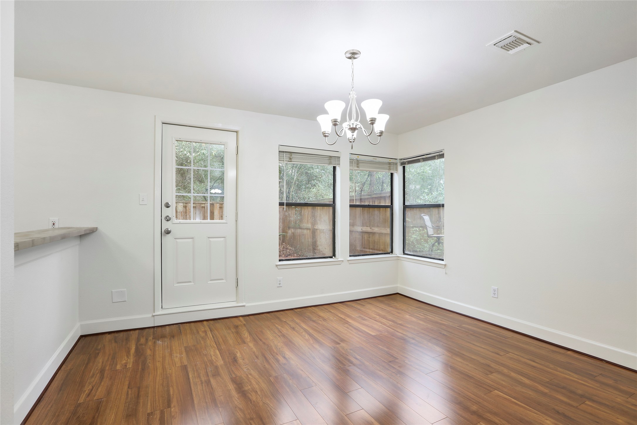 28 Sawmill Grove Lane Spring, TX 77380 - Photo 17 of 30 a view of empty room with wooden floor and fan