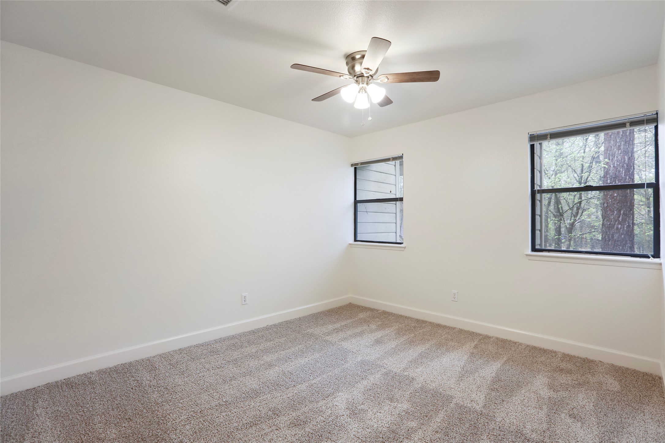 28 Sawmill Grove Lane Spring, TX 77380 - Photo 18 of 30 a view of empty room with windows