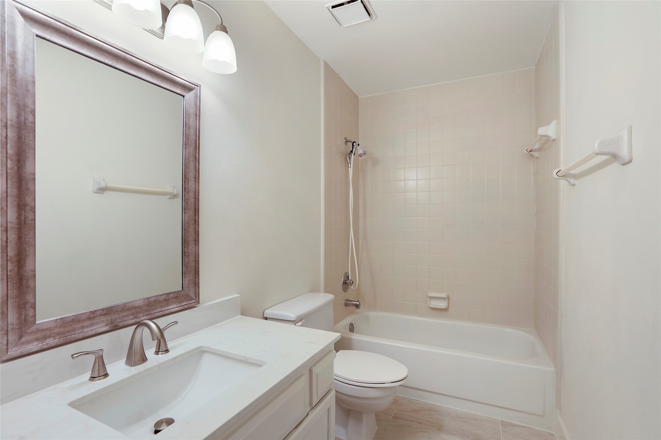 28 Sawmill Grove Lane Spring, TX 77380 - Photo 19 of 30 a bathroom with a sink toilet and shower