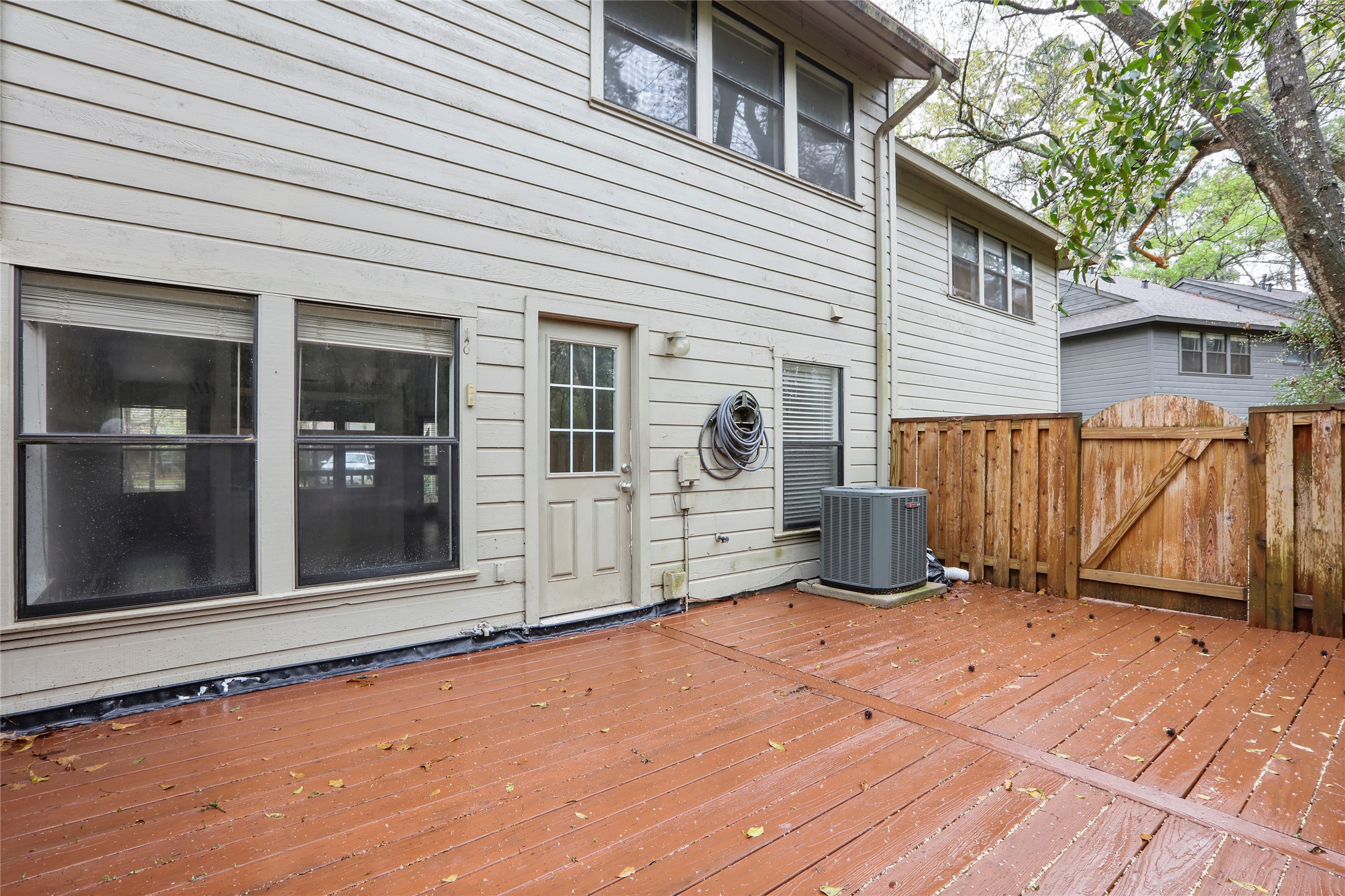 28 Sawmill Grove Lane Spring, TX 77380 - Photo 26 of 30 a view of a house with backyard and sitting area