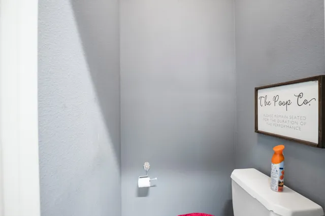 a bathroom with a toilet and sink