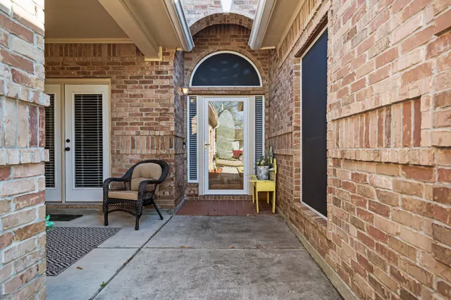 a house view with a outdoor seating space