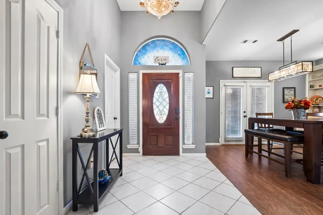 a view of hall way with furniture