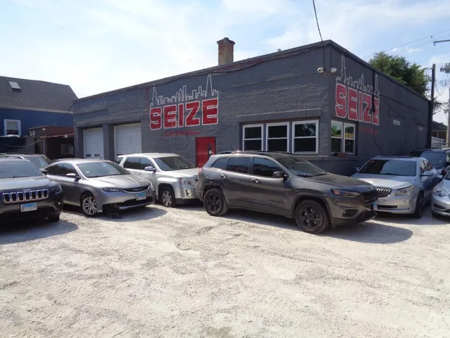 a view of a car parked in front of a house
