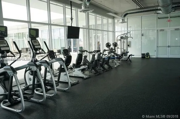a view of a room with gym equipment