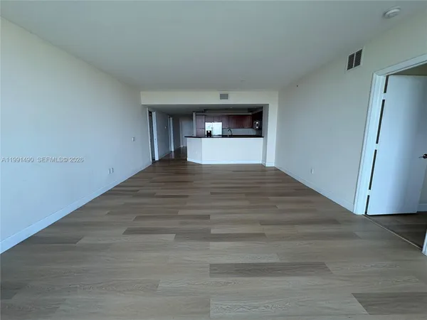 a view of a livingroom and a window