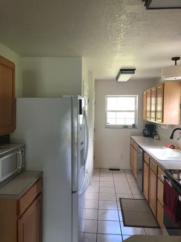 a view of room with gym equipment