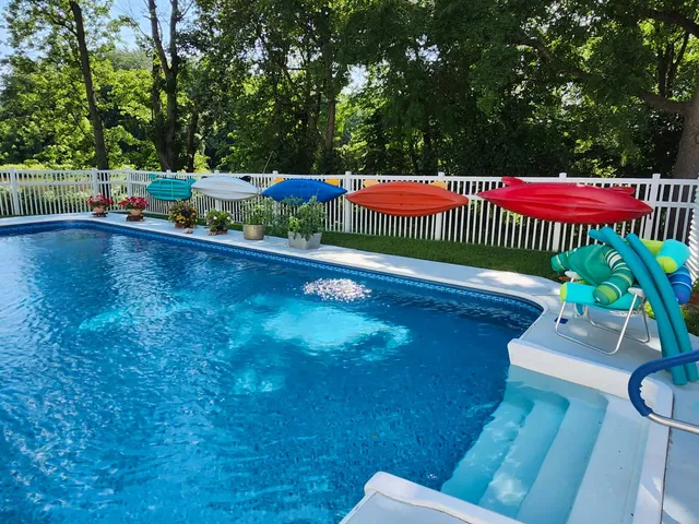 a view of a patio with swimming pool