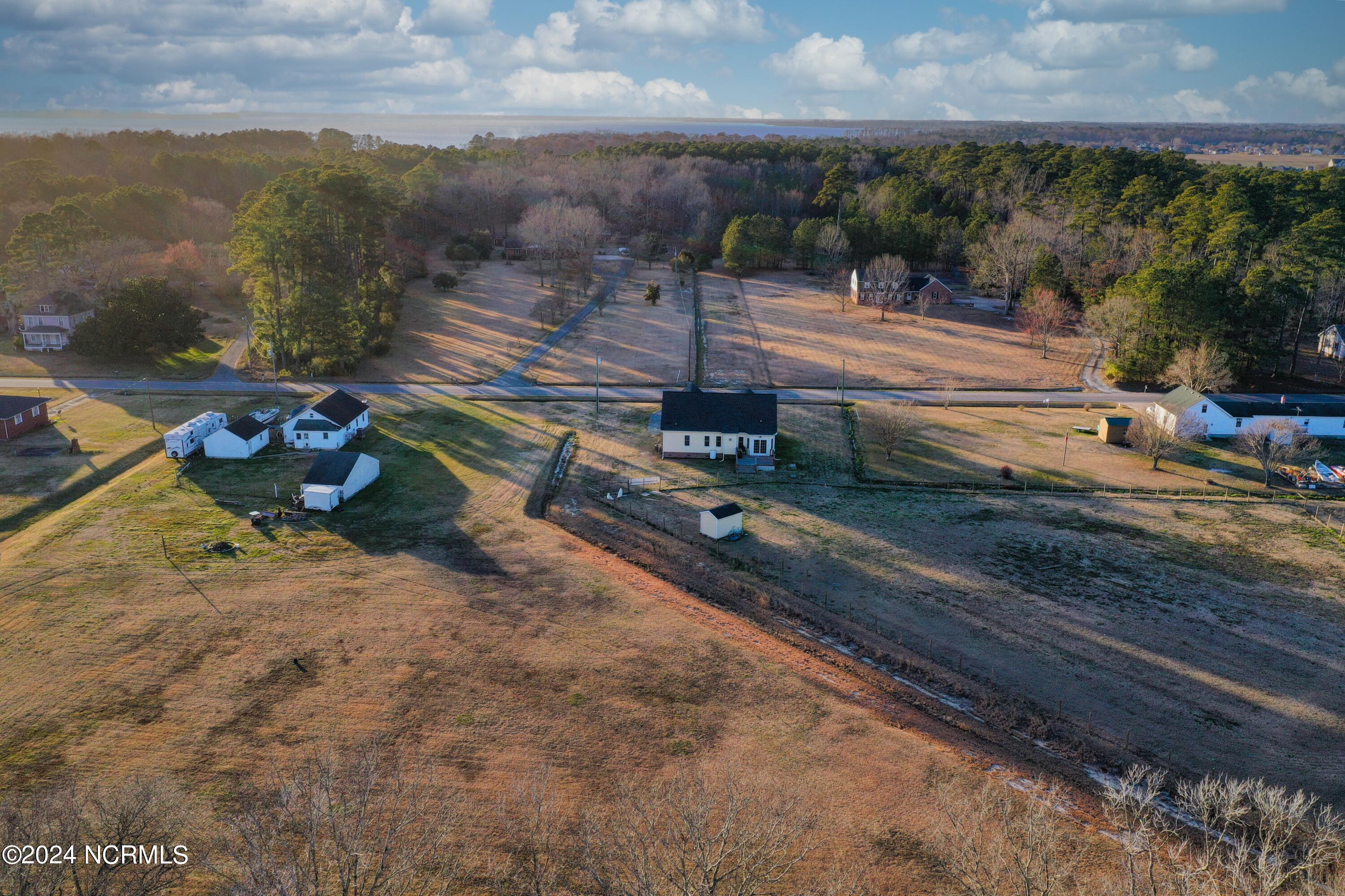 165 Milltown Road Camden, NC 27921 - Photo 1 of 30 2.4 acres in Camden with NO HOA! Nearby water access and gorgeous sunsets! 4 bedrooms, 2 baths and some nice bells & whistles!