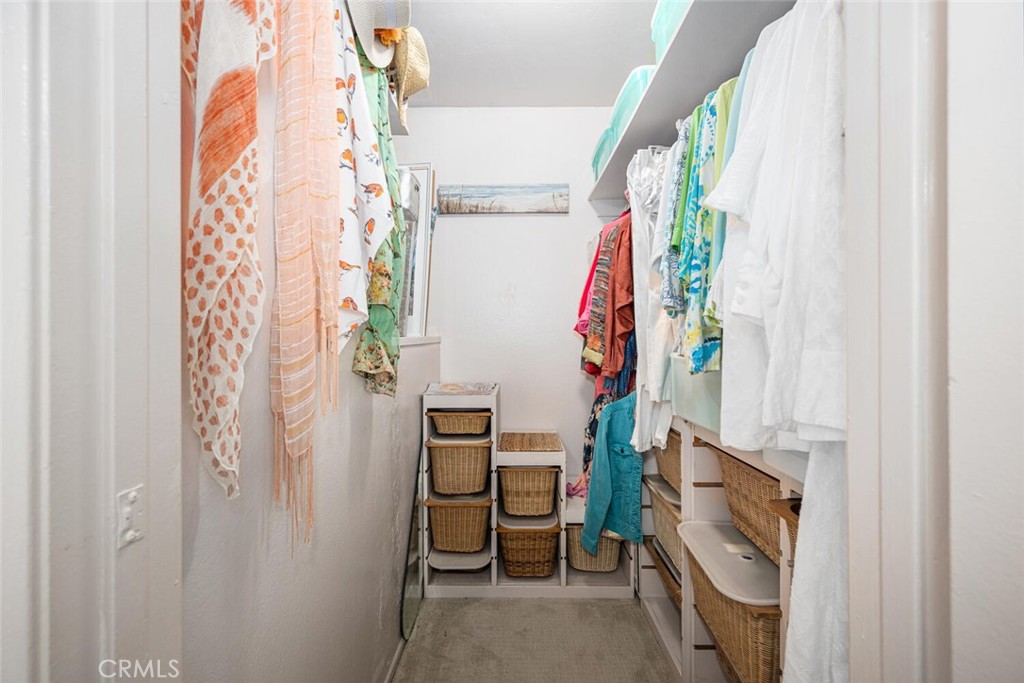 16393 Del Oro Circle, Unit 123 Huntington Beach, CA 92649 - Photo 19 of 24 a view of walk in closet