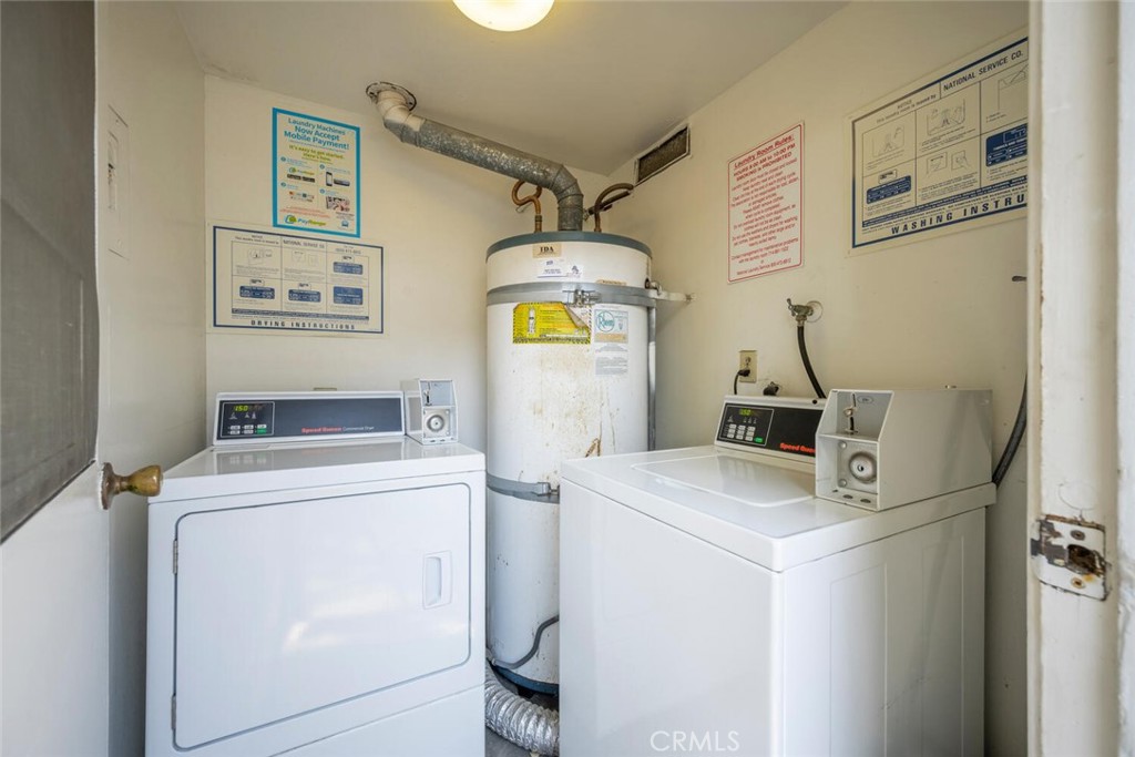 16393 Del Oro Circle, Unit 123 Huntington Beach, CA 92649 - Photo 20 of 24 a utility room with dryer and washer