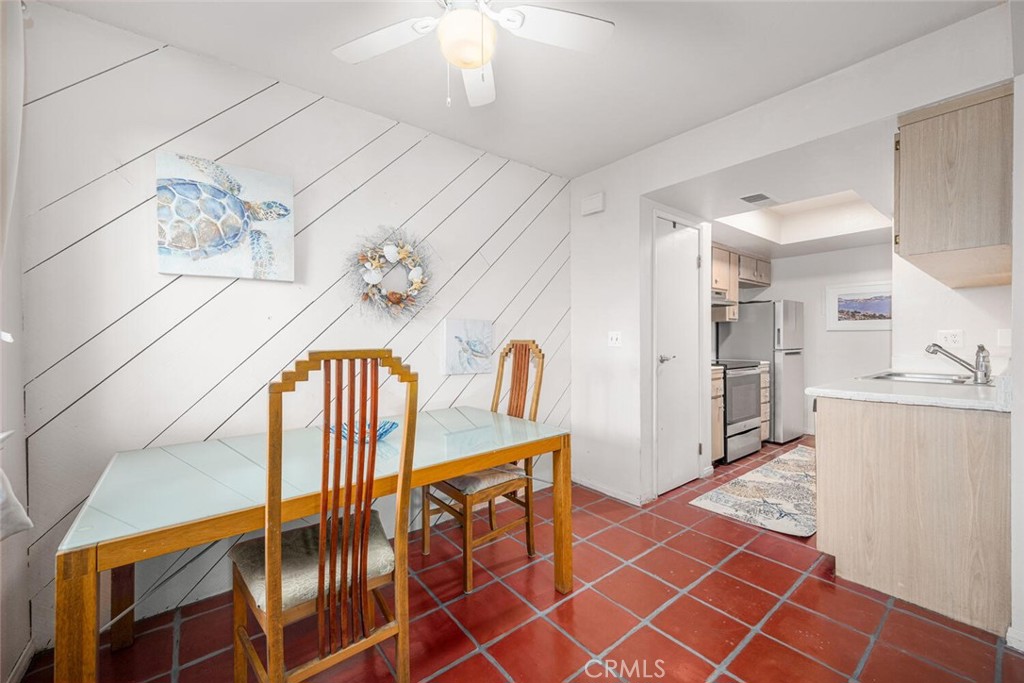 16393 Del Oro Circle, Unit 123 Huntington Beach, CA 92649 - Photo 7 of 24 a spacious bathroom with a mirror and a sink