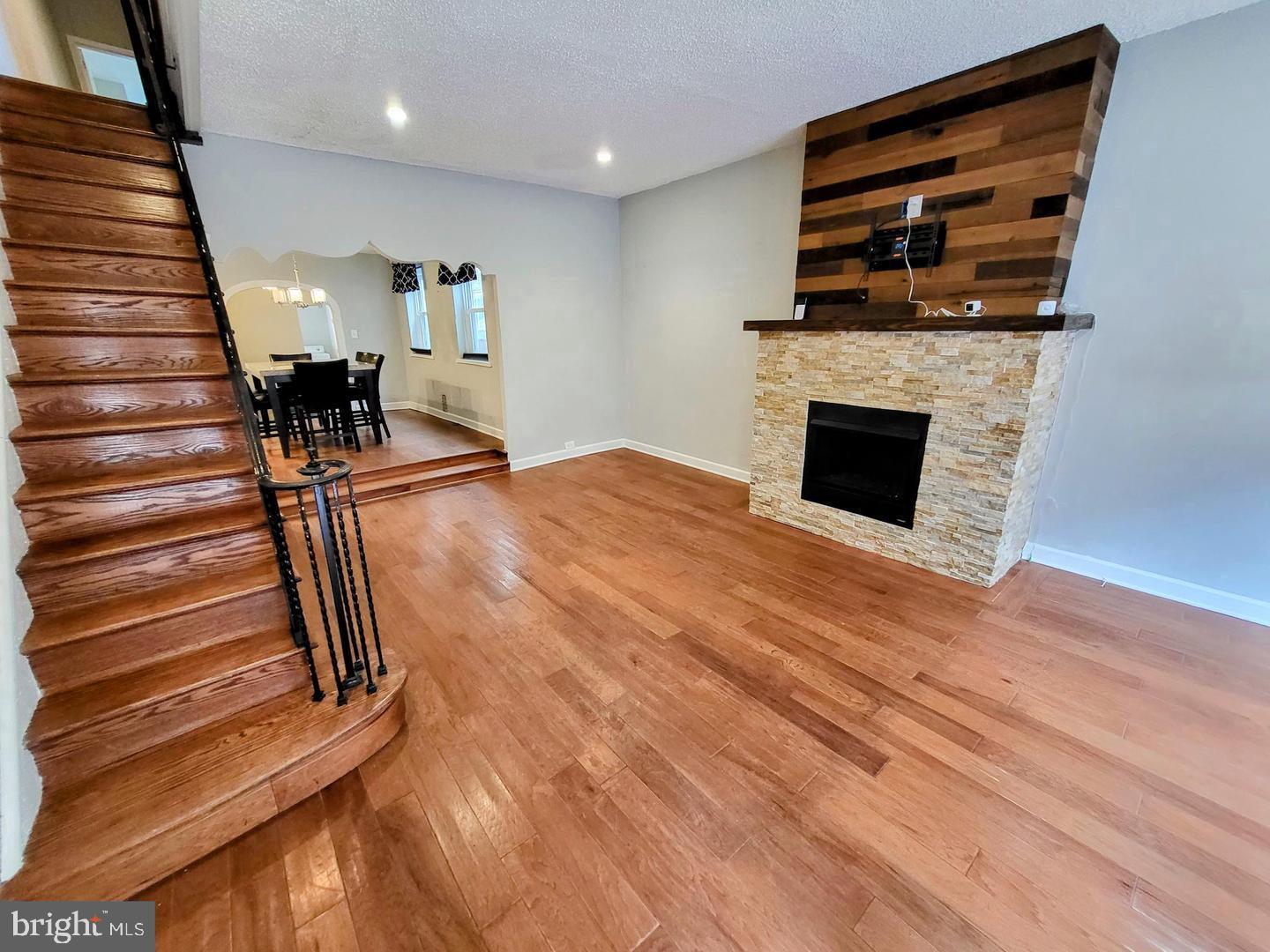 2237 Federal Street Philadelphia, PA 19146 - Photo 1 of 25 a view of a livingroom with wooden floor and staircase
