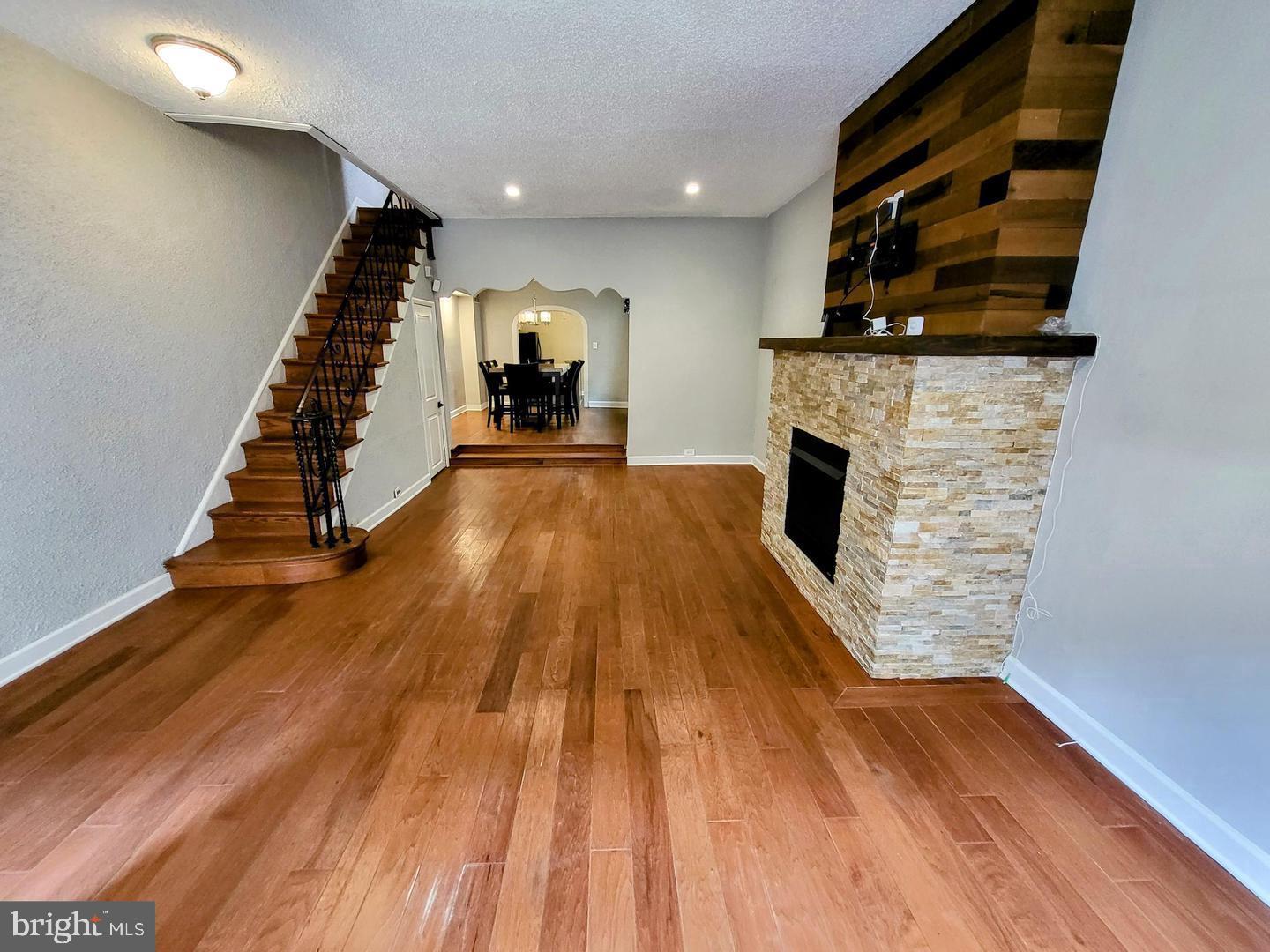 2237 Federal Street Philadelphia, PA 19146 - Photo 25 of 25 a view of a living room with wooden floor and staircase
