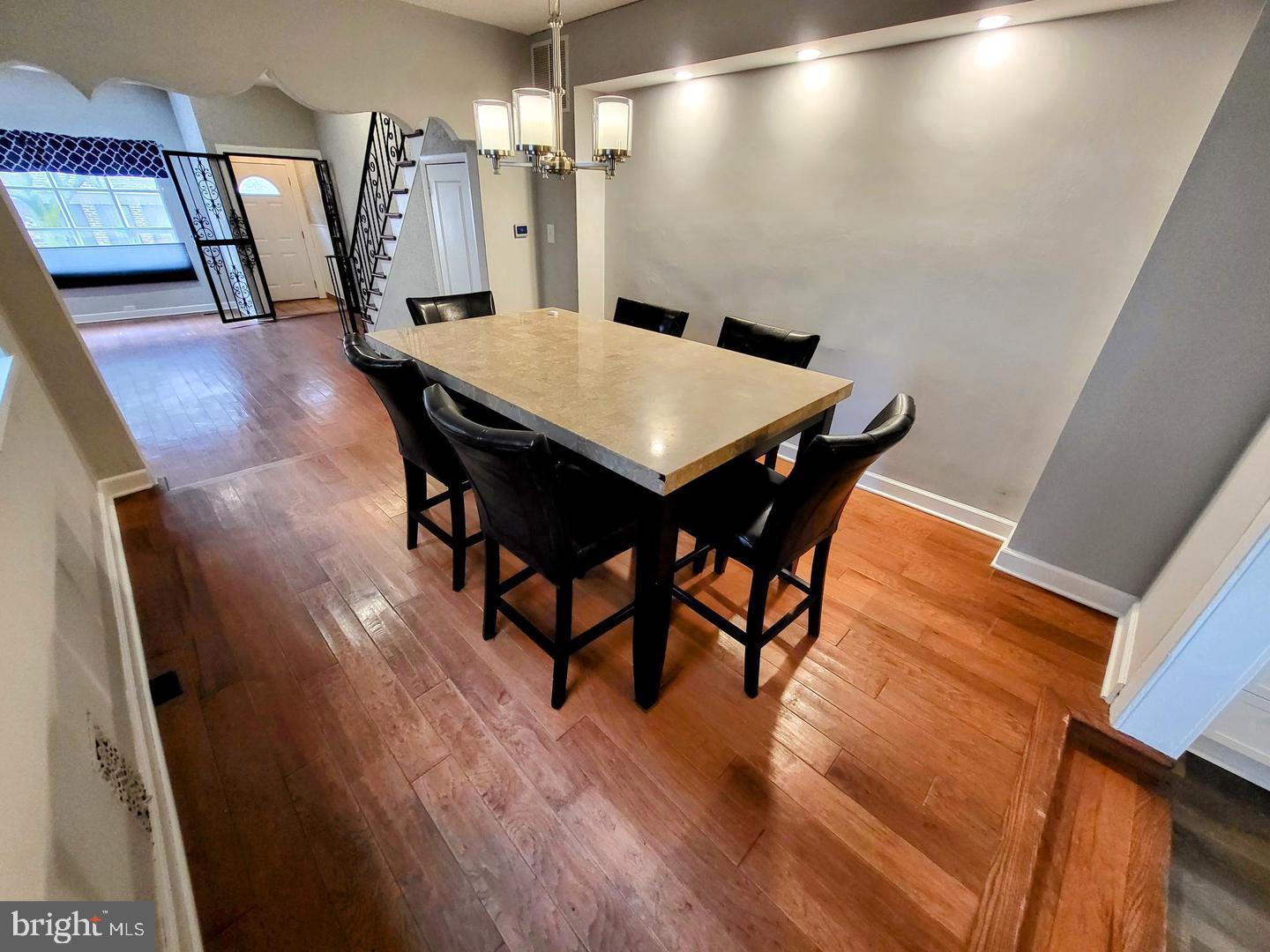 2237 Federal Street Philadelphia, PA 19146 - Photo 6 of 25 a view of a dining room with furniture and wooden floor