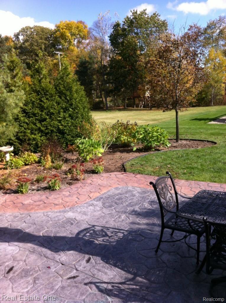 3133 East Maple Road Wixom, MI 48393 - Photo 10 of 37 Stamped Concrete Patio