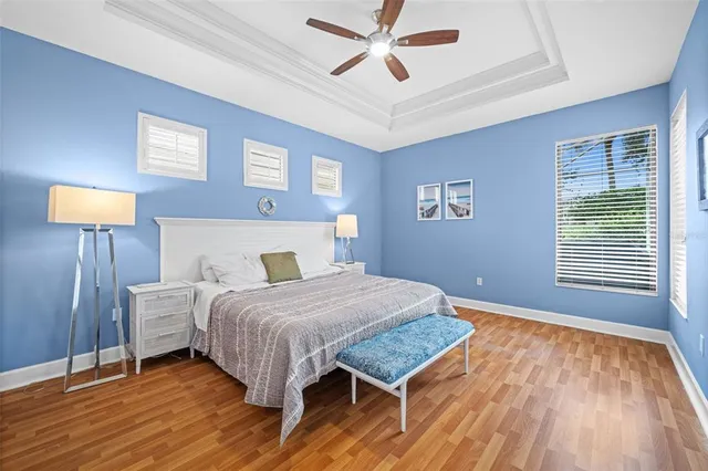 a view of a porch with furniture and a yard