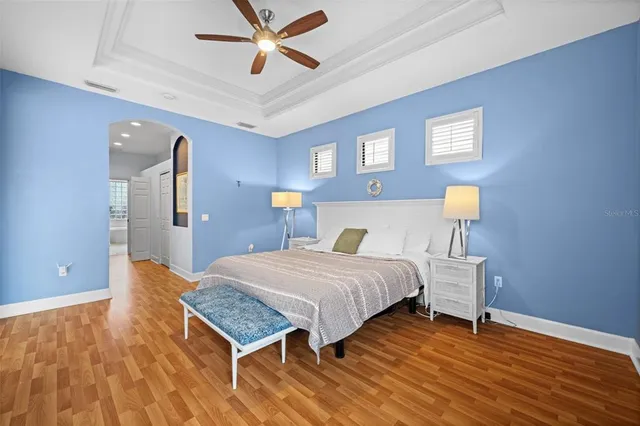 a view of a backyard with swimming pool