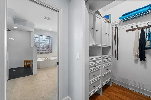 a view of a house with backyard porch and furniture