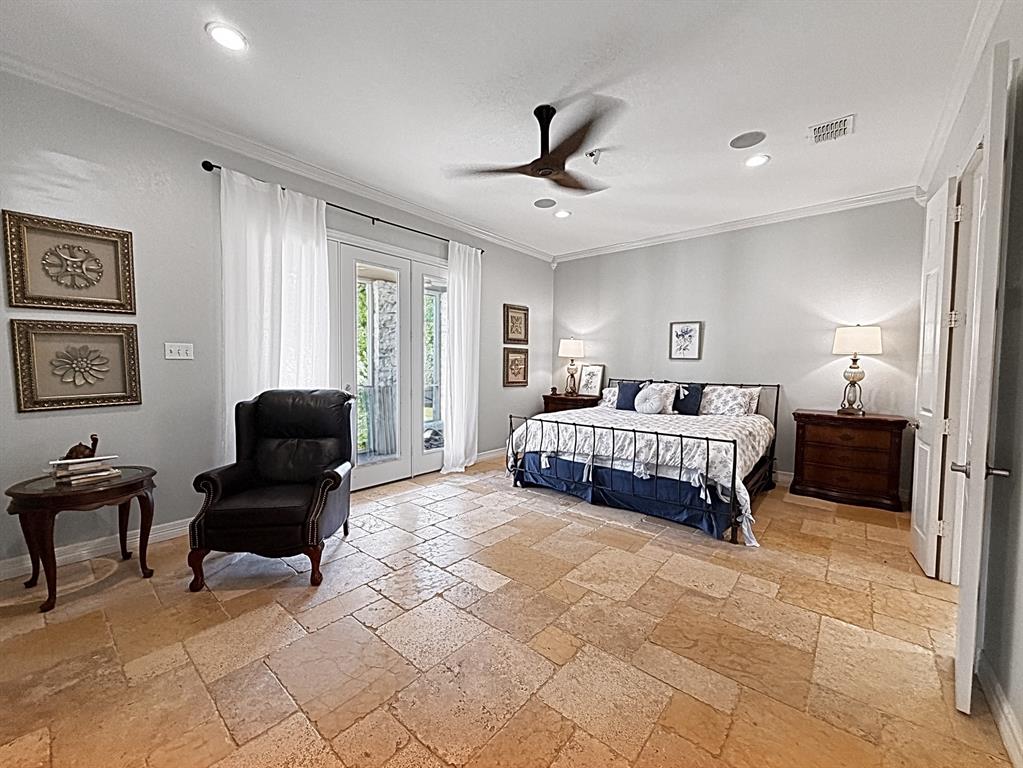 909 Higginbotham Lane China Spring, TX 76633 - Photo 12 of 40 a bedroom with a bed and a chair