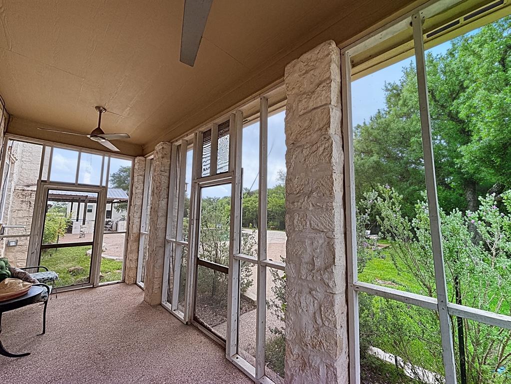 909 Higginbotham Lane China Spring, TX 76633 - Photo 20 of 40 a view of a porch with a floor to ceiling window