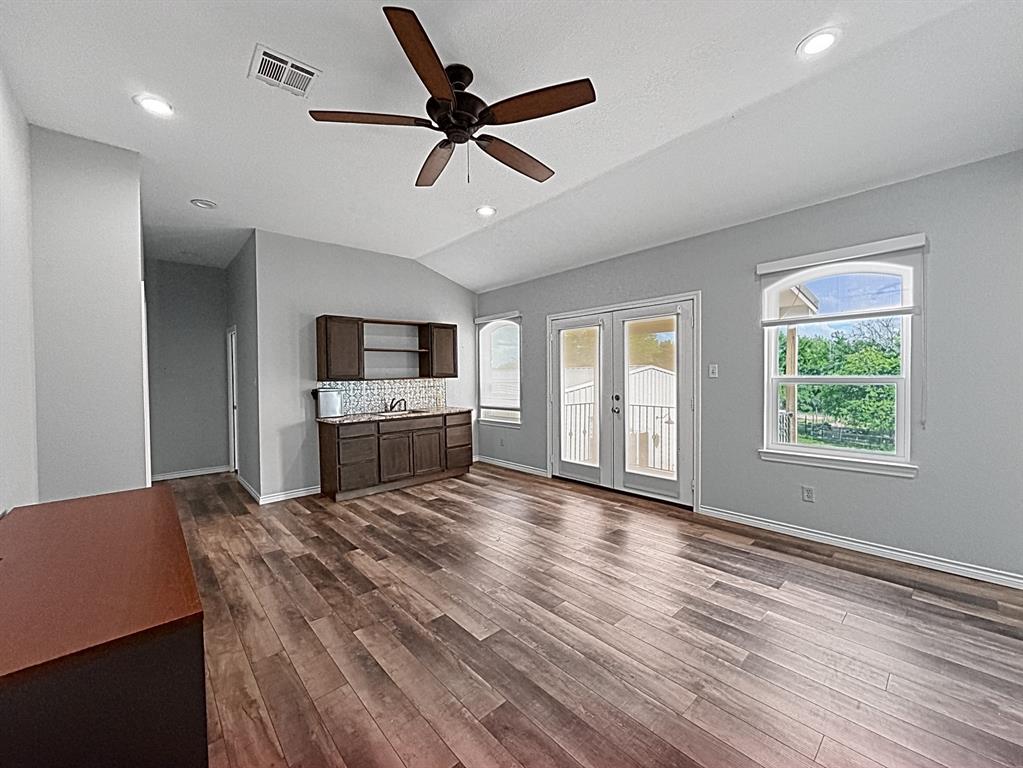 909 Higginbotham Lane China Spring, TX 76633 - Photo 23 of 40 a kitchen with a stove and a refrigerator